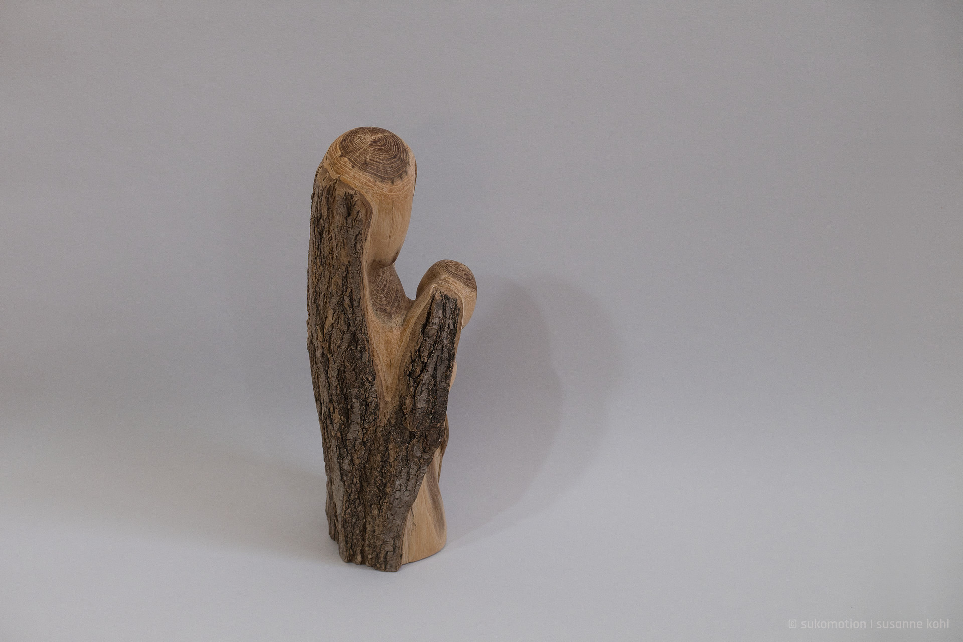 safe & curious - woodsculpture with bark by sukomotion | susanne kohl - berlin